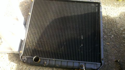 1978 Ford Bronco - Radiator part shown in a registry album section about motor rebuilds.