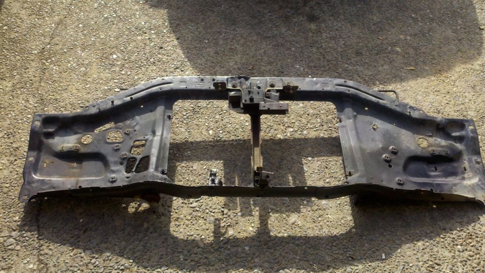 Radiator support frame for a vehicle, lying on the ground