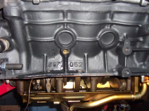 1991 Ford Taurus - Close-up of an engine block, showing casting numbers and internal components.