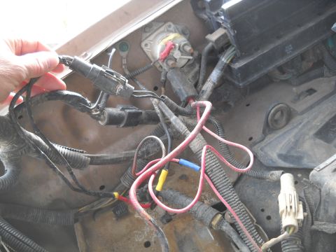 1992 Ford Explorer - Engine bay wiring harness detail with various connectors and wires visible.