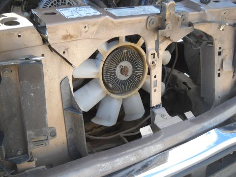 1992 Ford Explorer - The engine cooling fan and surrounding components are visible in this close-up engine bay shot.