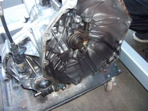1991 Ford Taurus - Close-up of a transmission assembly, likely for an engine swap, with visible internal components.
