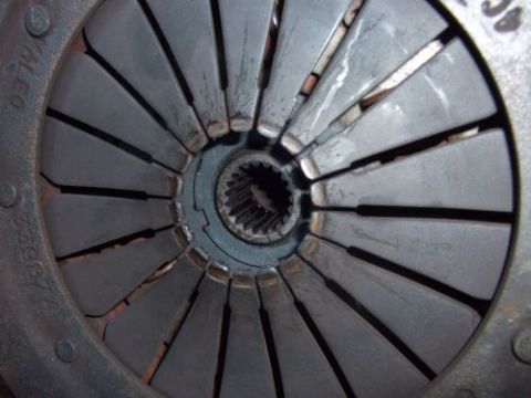 1991 Ford Taurus - Clutch disc splines and friction material shown in detail.