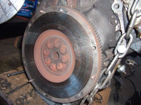 1991 Ford Taurus - This image shows a close-up view of an engine's flywheel, a critical component for power transmission.