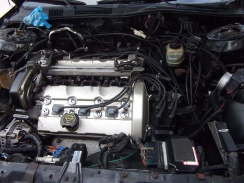 1991 Ford Taurus SHO engine bay, V6 engine with silver valve covers