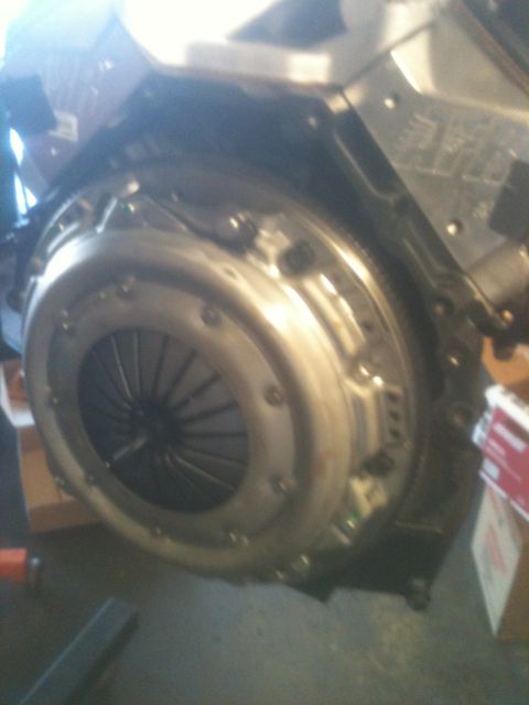 1993 Ford Bronco - Close-up of a vehicle's clutch and flywheel assembly.