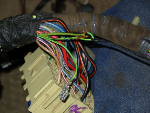 1983 Ford Bronco - I used an old wire coat hanger as a fish to pull the new A-pillar feed in through the instrument cluster takeout, along with the engine bay…