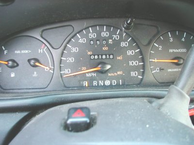 1997 Ford Taurus - The dashboard of a 1997 Ford Taurus shows the odometer reading 081818 and various gauges.
