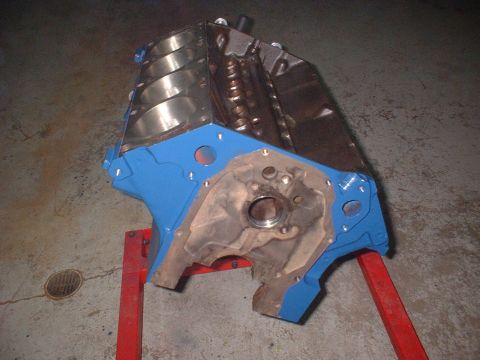 1969 Mercury Cyclone - Engine block on a stand, with blue paint and exposed metal components.