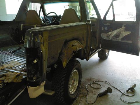1992 Ford Bronco - This heavily modified Ford Bronco appears to be undergoing restoration or repair work.