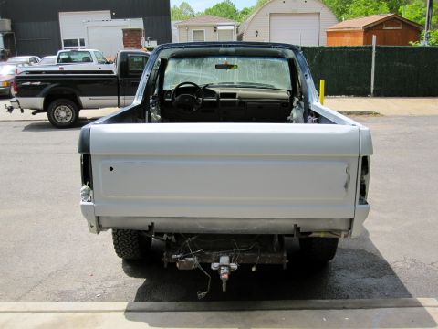 1992 Ford Bronco - This 1992 Ford Bronco is shown from the rear with its top removed, awaiting restoration.