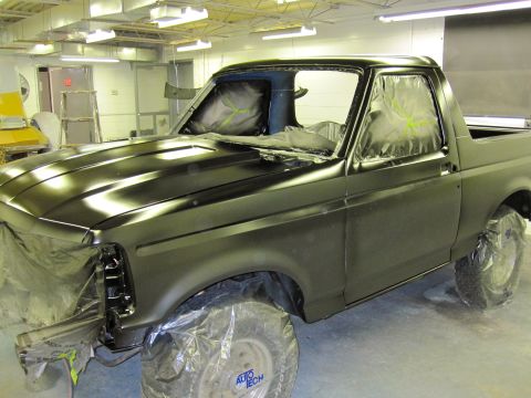 1992 Ford Bronco - 1992 Ford Bronco is prepped for paint in a professional booth.