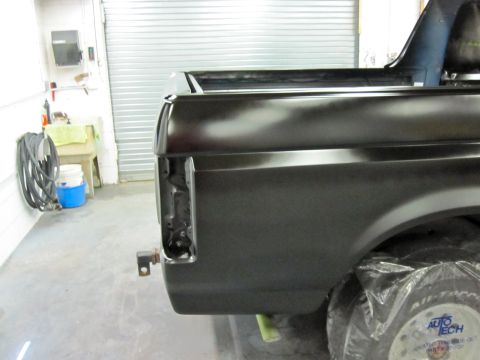 1992 Ford Bronco - This Ford truck is in a body shop, undergoing preparation for a new paint job.
