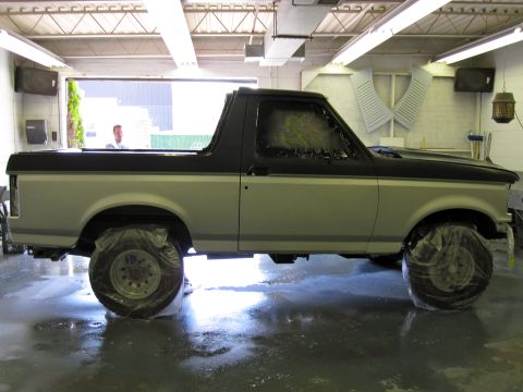 1992 Ford Bronco - This 1992 Ford Bronco is in a garage, likely being prepped for a paint job.