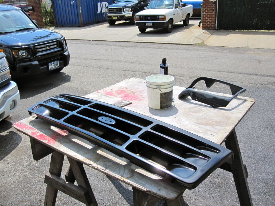 same with all the chrome plastic parts, door handles, wipers and antenna. windshield trim as well. FORD oval is original! i ordered the grill and head light bezels black off of ebay. all three were a different shade of black so needed to paint those.