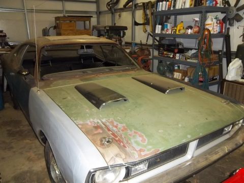 1971 Dodge Dart - This 1971 Dodge Dart is undergoing restoration work in a garage setting.