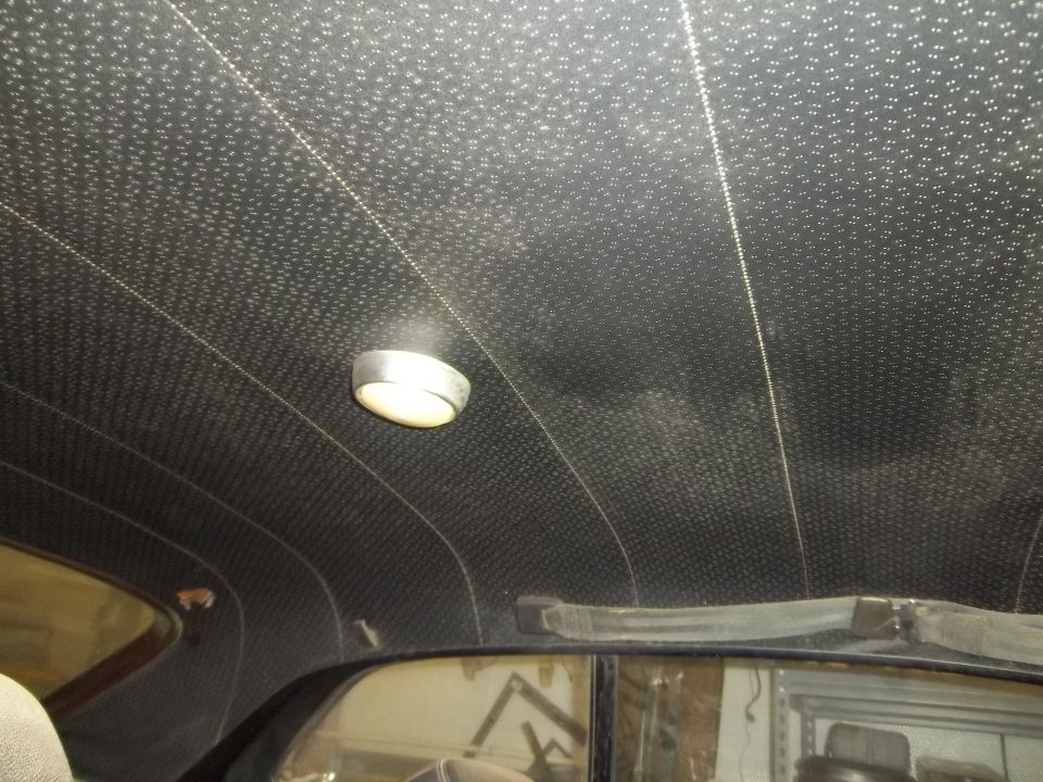 Interior headliner with dome light