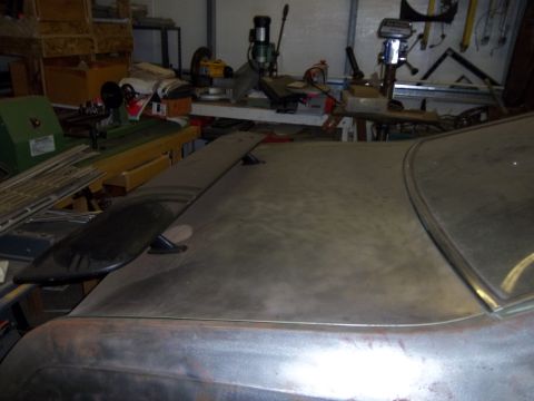 1971 Dodge Dart - Unfinished car trunk with a black spoiler is visible in a workshop setting. The registry claims it is a 1971 Dodge Dart, but this is not ve…