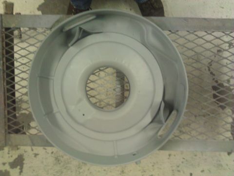 1971 Dodge Dart - A gray air cleaner housing is shown from above, resting on a metal grate.