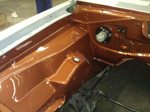 1971 Dodge Dart - The engine bay of a 1971 Dodge Dart shows off its freshly painted orange finish.