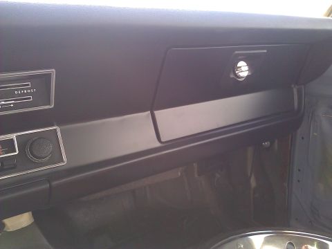 1971 Dodge Dart - Interior view of a 1971 Dodge Dart dashboard, highlighting the glove compartment and climate controls.