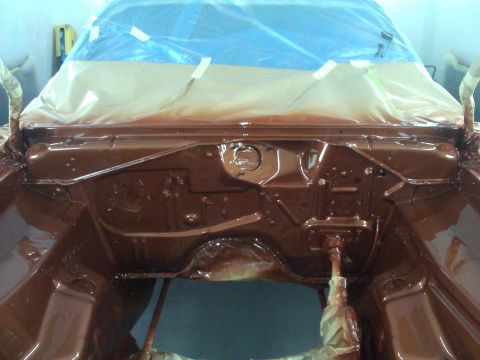 1971 Dodge Dart - The engine bay of a car is being prepped and painted, with the windshield covered.
