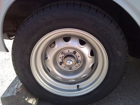 1971 Dodge Dart - Close-up of a silver steel wheel and tire, with a Supermotors.net watermark.