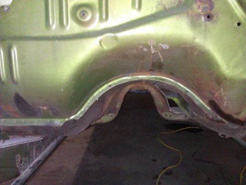 1971 Dodge Dart - Undercarriage frame section of a car, showing rust and damage.