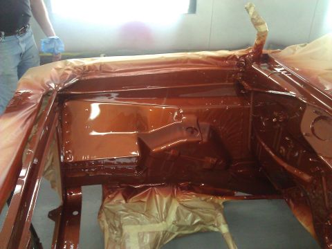 1971 Dodge Dart - The interior of a car is covered in brown paint during a restoration project.
