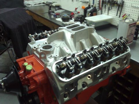1971 Dodge Dart - Close-up of a V8 engine's intake manifold and valve covers, showing internal components.