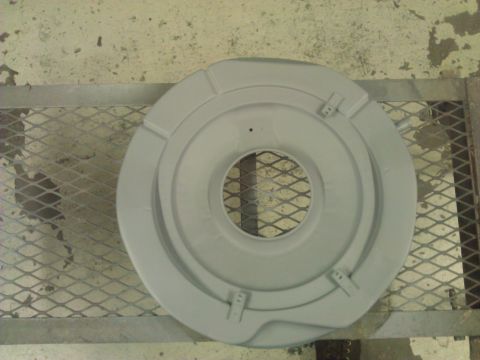 1971 Dodge Dart - A gray air cleaner housing is shown from a top-down perspective, resting on a metal grate.