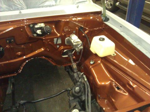 1971 Dodge Dart - The engine bay of a 1971 Dodge Dart shows off its freshly painted copper finish.