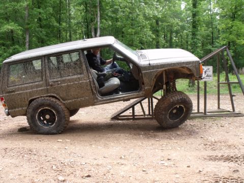 1992 Jeep Cherokee - Modified Jeep Cherokee undergoing off-road testing on ramps.