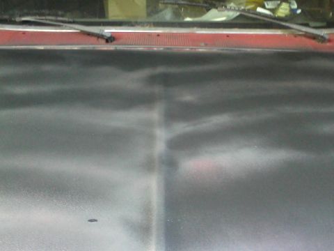 1988 Ford F-150 - Close-up view of a truck's hood, showing red trim and windshield wipers. The image includes a 'SUPERMOTORS.NET' watermark.