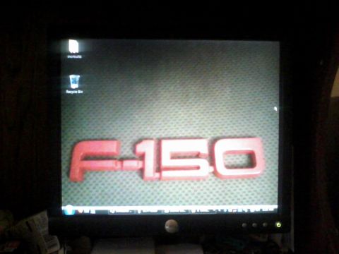 1988 Ford F-150 - A computer screen shows the F-150 emblem as its wallpaper.