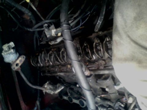 1988 Ford F-150 - Close-up view of an engine's internal valve train components.