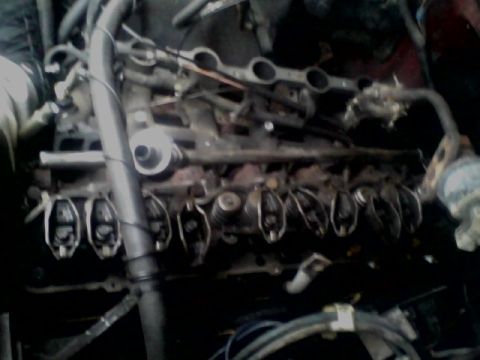 1988 Ford F-150 - The internal components of an engine's valve train are visible in this close-up shot.