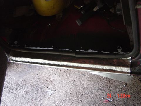 1988 Ford F-150 - Repairing a rusted rocker panel on a vehicle with a new metal patch.