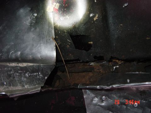 1988 Ford F-150 - Close-up of rusted metal and repairs, showing a date stamp of 9:46 PM.