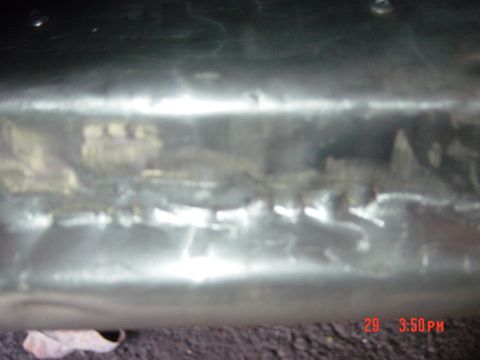 1988 Ford F-150 - A close-up view of a damaged metal surface, with a timestamp indicating it was taken on the 29th at 3:50 PM.