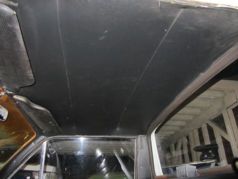 1964 Ford Ranchero - Interior shot of a car's headliner, showing the fabric and seams.