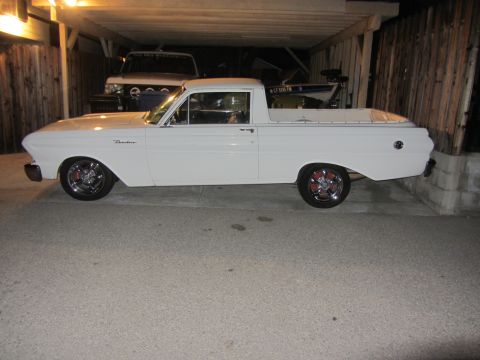 1964 Ford Ranchero - The night this 1964 Ford Ranchero was purchased, parked under a carport with another vehicle and a boat visible behind it.