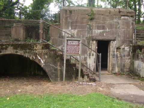 2003 Jeep Wrangler - A historical concrete bunker structure stands with a sign detailing its history and an entranceway.