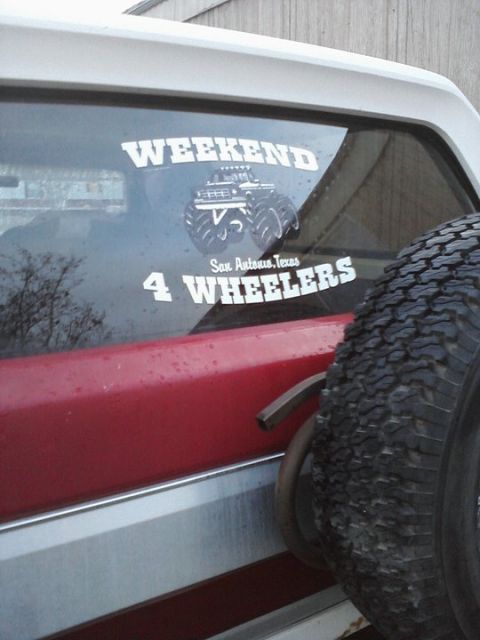 1989 Ford Bronco - This Ford Bronco has a spare tire on the back and window decals for 'Weekend 4 Wheelers'.