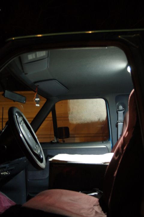 1992 Ford F-150 - The interior of a truck cab is visible, the steering wheel, seats, and dashboard area.