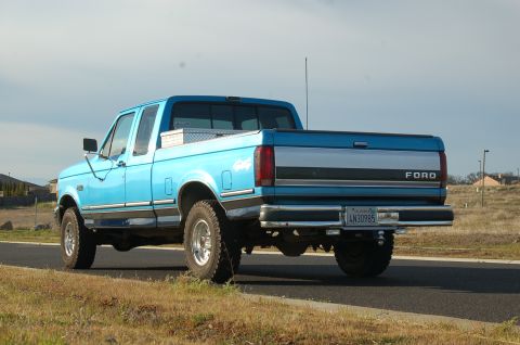 1992 Ford F-150 - This 1992 Ford F-150 pickup truck is seen from the rear, a toolbox mounted in the bed.