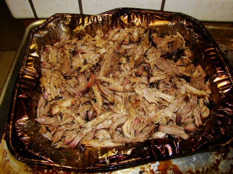 1989 Ford Bronco - A pan full of pulled pork sits on a baking sheet.