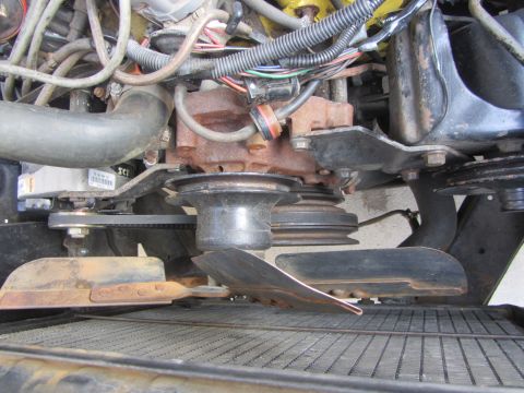 1964 Ford Ranchero - Close-up view of the engine bay components, including the fan and radiator, with visible hoses and wiring.