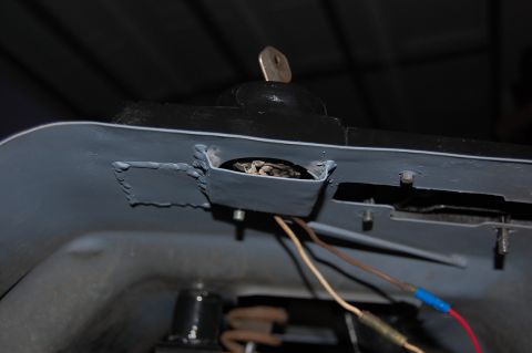 2010 Kawasaki BAYOU 220 - Close-up of a vehicle's ignition lock cylinder with a key inserted and visible wiring.