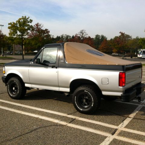 1992 Ford Bronco - love this soft top. i forget the company name and when i bought it, it matched the tan eddie bauer trim. still looks ok. the only drilling…
